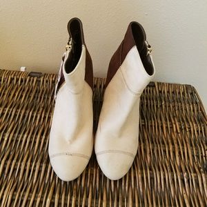 Modern wedge heel booties